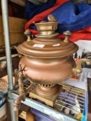 A copper tea urn, military gas masks, wooden bound trunk and dressmakers mannekin