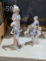 A selection of Nao figures, mostly depicting children