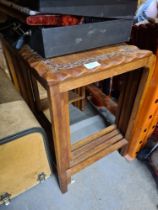 Carved nest of tables, sewing machine and accordian.