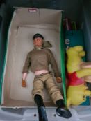 A selection of vintage dolls, including Action Man, Winnie the Pooh collection and a Miss Dan-Air do