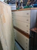A pair of 1970s Meredew four drawer chests having teak tops and a matching laundry chest (3)