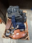 Binoculars, cameras and sundry (a small tray)