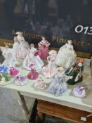 A selection of mostly Coalport figurines some being limited edition, Anniversary Figure of the Year