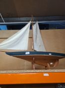 A scratch built pond yacht on stand