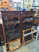 An old mahogany 2 door display cabinet with adjustable shelves and bracket feet, 127cm