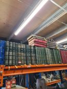 A shelf of books including Dickens, War and Peace, etc