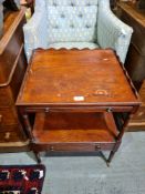 A Regency style armchair on turned legs and a reproduction two tier table having one drawer