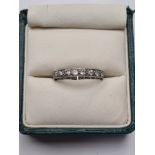 Unmarked white gold full Eternity ring inset brilliant cut diamonds, size Q, approx 3g
