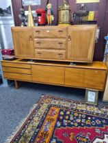 White and newton, a vintage 1970s sideboard having three drawers and cupboards, 216.5cms