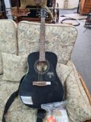 A fender black acoustic guitar, model CD-60/BLK