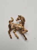9ct yellow gold brooch in the form of a horse, 3cm width, marked 375, 6.4g