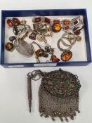 Tray of mostly silver and amber costume jewellery, white  metal mesh bag, etc