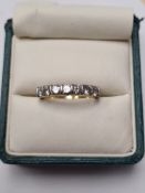 18ct yellow gold half eternity ring inset with 7 round brilliant cut diamonds, each approx o.20carat