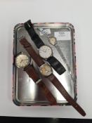 Tudor; A vintage gent's Tudor wristwatch with number 12, 2 4, 8, 10 and dot markers, winds and ticks