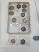 A small box of Silver coins to include 2 x 1711 Queen Ann Shillings, George II Shilling, George IV e