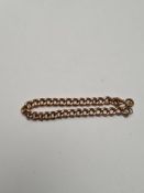9ct gold tubular curblink bracelet, marked 9, with safety chain, 8.3g