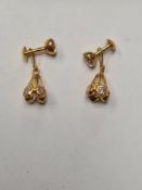 A pair of pretty 9ct yellow gold dress studs set with clear stones, 2g