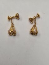 A pair of pretty 9ct yellow gold dress studs set with clear stones, 2g