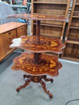 A 19th Century Dutch marquetry folding three tier whatnot having floral decoration, open height 112.