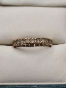 18ct clear stone set eternity ring, marked 18, size O, approx 3.86g