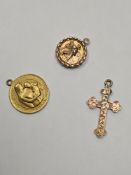 3 9ct gold charms, a cross, Madonna and child etc 2.81g