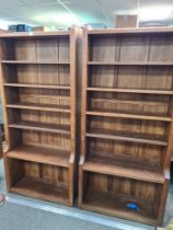 Robert "Mouseman" Thompson; a pair of large galleried bookcases with four adjustable shelves to each