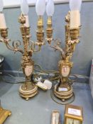 A pair of early 20th Century, French gilt metal and alabaster lamps each having 3 sconces, 40cm