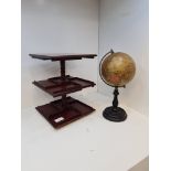 An old Geographia 6 inch Terrestrial globe on ebonised stand and a small mahogany table top revolvin