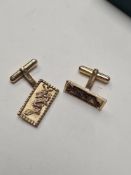 Pair of 9ct yellow gold cufflinks, rectangular panels decorated with Chinese dragons, one AF, marked