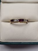 18ct yellow gold half hoop ring, channel set with 6 rubies and 4 diamonds, size 750, size K, 2.78g