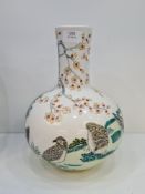 A 20th Century Chinese vase bulbous vase, possibly Republic period, decorated feeding birds, 30.5cms