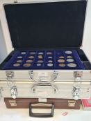 Three cases of mixed mainly British coins to include a Silver 1819 George III Crown, Silver 1845 Vic