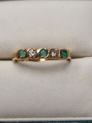 18ct yellow gold band ring inset with emeralds and diamonds, 5 round cut stones, size O, approx 3g,