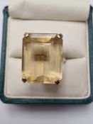 9ct yellow gold cocktail ring set with large step cut citrine, 22mm x 17.8mm marked 375, Birmingham,