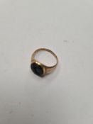18ct yellow gold signet ring with oval agate panel,, carved, 4.2g