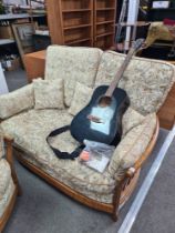 A modern Ercol, slatback two seat settee and matching armchair