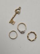 2 9ct gold charms, a 21st Birthday key and a wedding trilogy, 4.13g