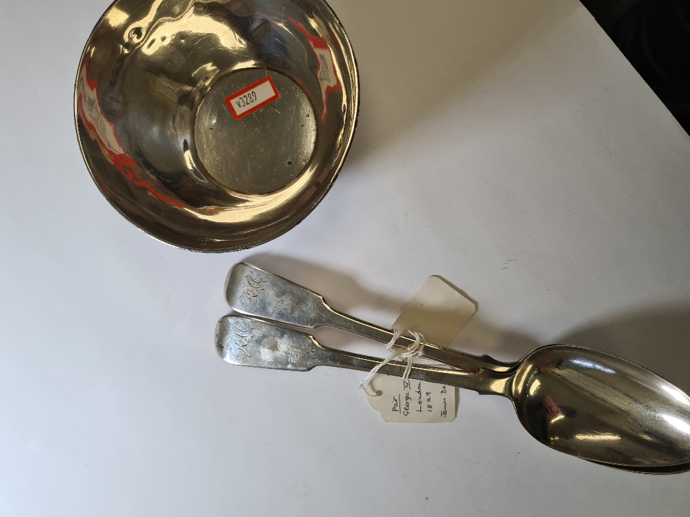 A pair of Georgian silver serving spoons by James Beebe London 1829. Also with a silver bowl having