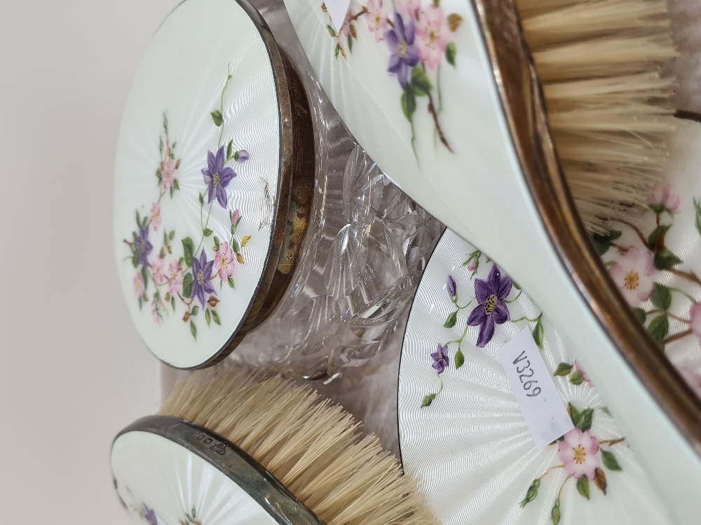 Garrard and Co Ltd., a stunning silver and enamel dressing table set consisting of brushes, a mirror - Image 4 of 5