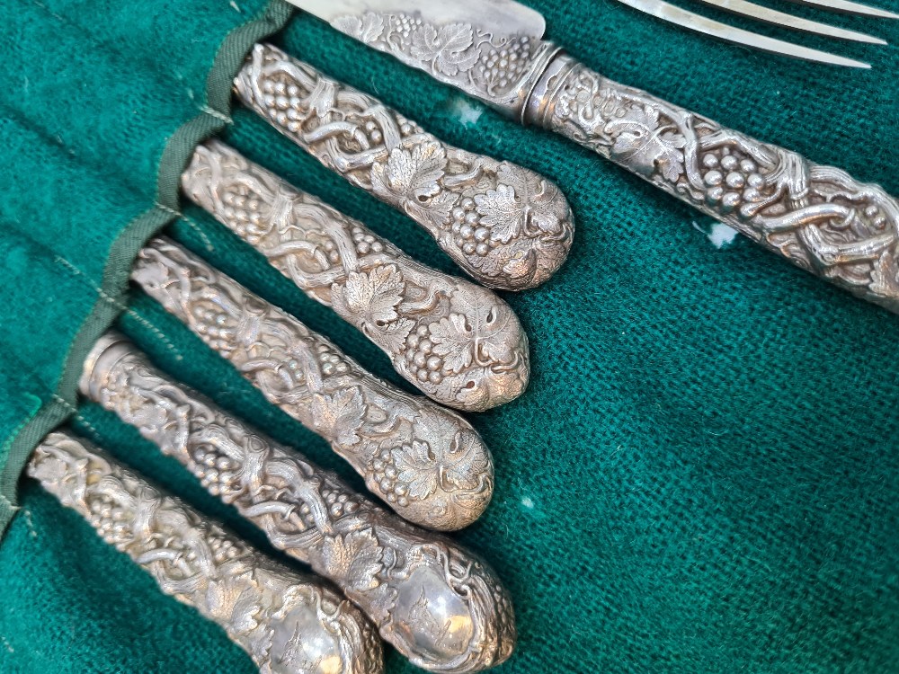 A set of six Victorian silver fruit knives and forks, with heavily embossed handles of vines and gra - Image 10 of 12