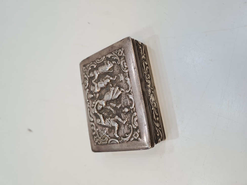 A Dutch second standard silver ornate box of intricate design showing an embossed scene of figures d - Image 5 of 8