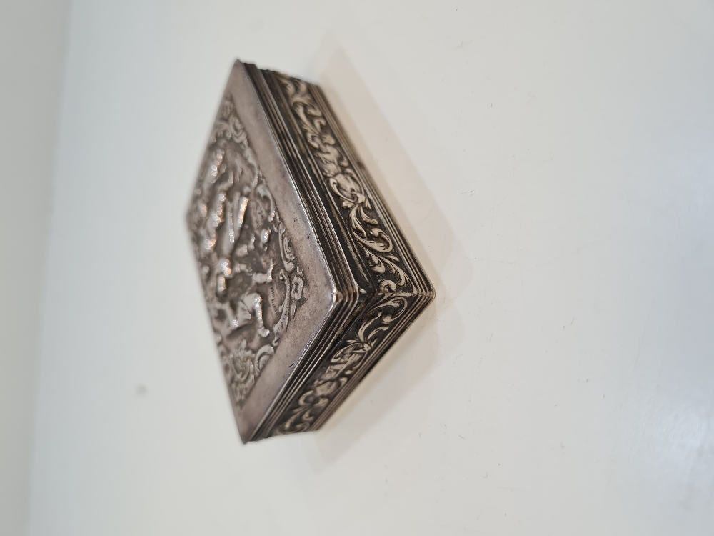 A Dutch second standard silver ornate box of intricate design showing an embossed scene of figures d - Image 4 of 8