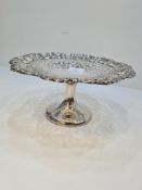 A superb silver Edwardian bon bon dish having intricate pierced design, embossed border and raised o