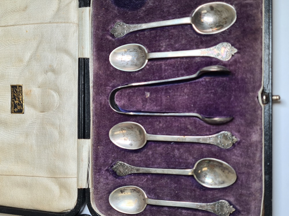 Cased silver teaspoons and sugar tong, excluding one teaspoon, having decorative handle ends, hallma - Image 8 of 15