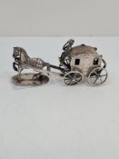 A novelty silver Victorian horse and cart having sweet design of figures inside the carriage. Detail