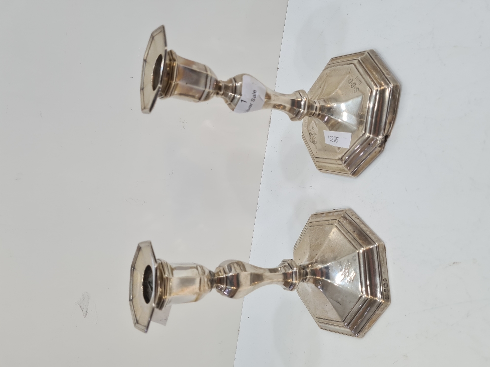 A pair of Hawksworth Eyre and Co Ltd silver candlesticks, having octagonal moulded pedestal bases, o - Image 16 of 18