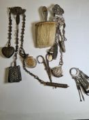 A silver handled brush, also with silver and white metal belt items to include manicure items, penkn