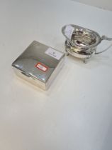 A silver cigarette box by William Comyns and Sons, London 1934. having engraved top. Also with a sil