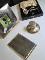 A silver Carrs, Sheffield, photo frame having thick silver border. Also with a silver cigarette case