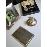 A silver Carrs, Sheffield, photo frame having thick silver border. Also with a silver cigarette case